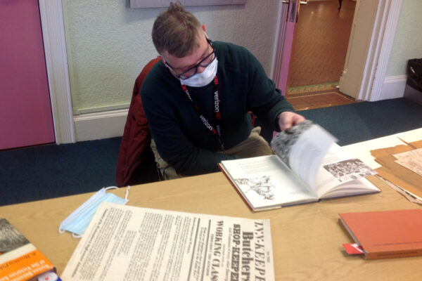 photo of Martin exploring documents at the Working Class History Museum