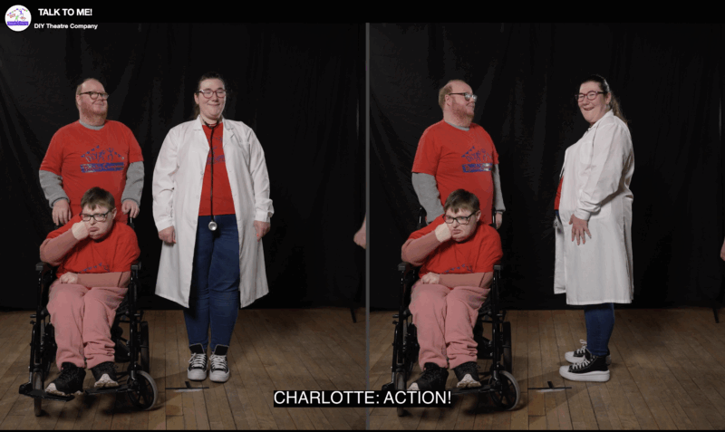 Three DIY Theatre Company performers are acting out a scene from the Acting for Health film series. On the left side of the split screen, a woman in a wheelchair sits in front of a man and a woman dressed as a doctor, all wearing red DIY Theatre t-shirts. On the right side of the screen, the same three performers are seen mid-scene from a different angle. The woman dressed as a doctor is smiling, the man stands behind the wheelchair, and the woman in the chair looks ahead with a focused expression. The caption at the bottom reads “CHARLOTTE: ACTION!